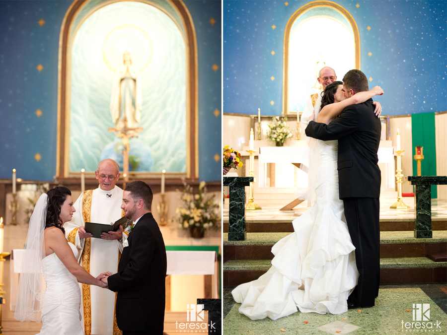 First kiss at St. Mary’s church in Sacramento, California by Sacramento wedding photographer Teresa K
