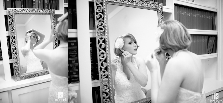 bride doing make-up in mirror