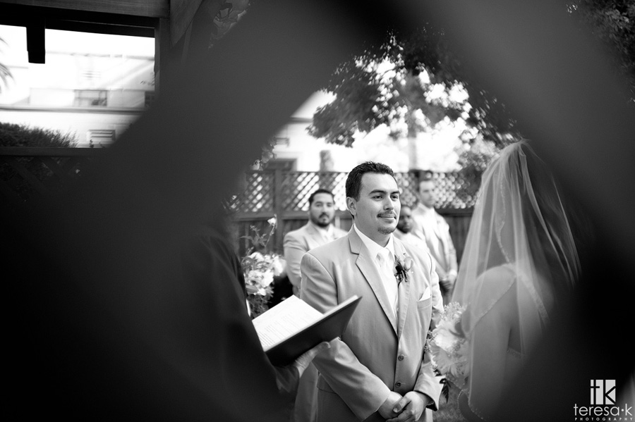 view of groom at outdoor ceremony