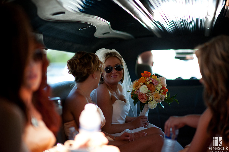 wedding party rides in limo to st Mary’s church wedding