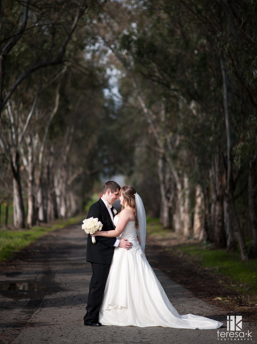 bride and groom on a road