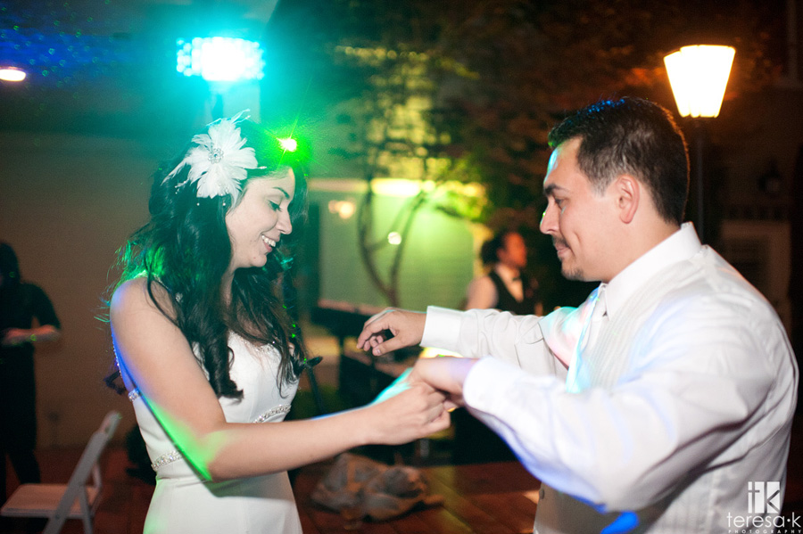 bride and groom dancing away the nigh