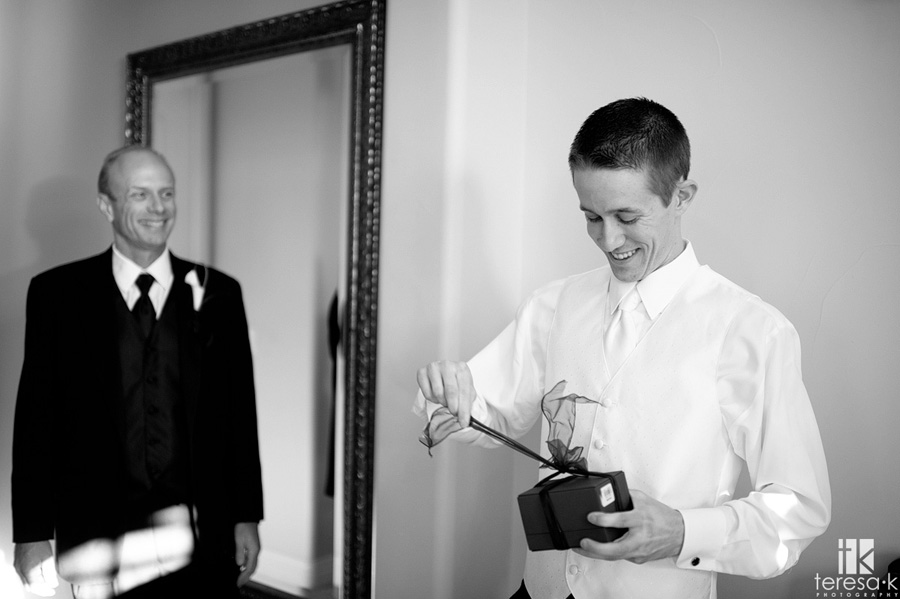 groom opening pre-wedding gift