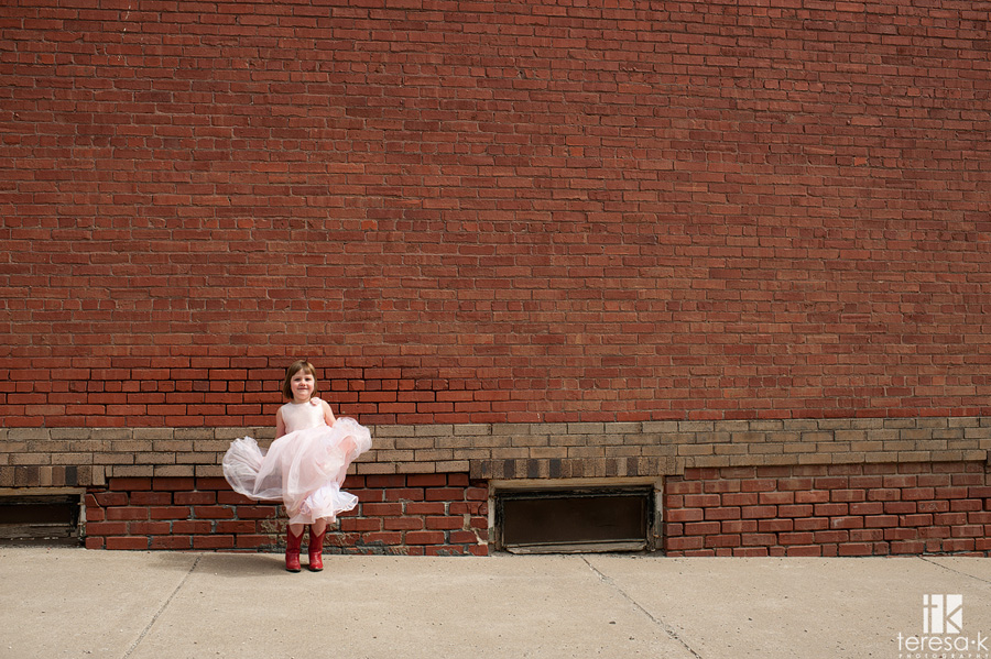 fun little girl in pink skirt