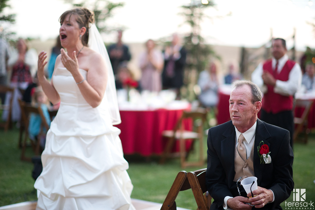 bride and groom react to BIG present