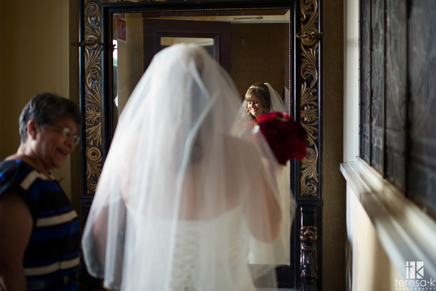 bride in the mirror at the firehouse restaurant