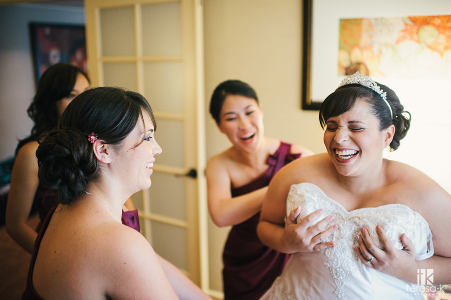 beautiful bride surrounded by bridesmaids